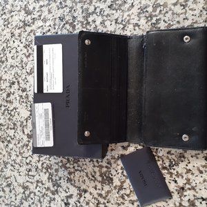 2 authentic prada wallets each